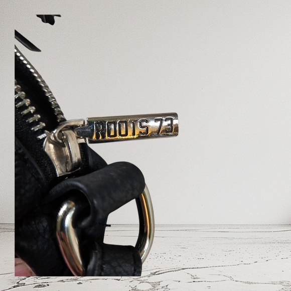 Roots Black Cute Crossbody Bag with Tassel - Picture 2 of 13